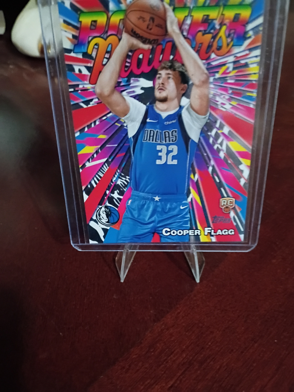 Topps Cooper Flagg Basketball Card with Blue Jersey and Multicolor Background